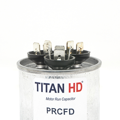Packard Titan HD PRCFD5575A Dual Motor Run Capacitor, 55/7.5 MFD, 440/370 VAC, Round, 2 Number Of Sections, 3.88" Overall Height, 2-1/2" Diameter, Aluminum (Case), Steel (Cover) Housing Material